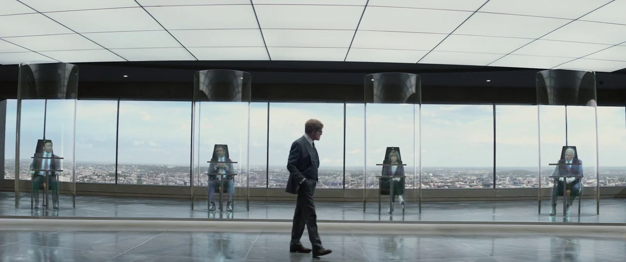 Captain America: The Winter Soldier (2014) movie still: wide — A modern, high-rise office features large windows overlooking a city skyline. Four…