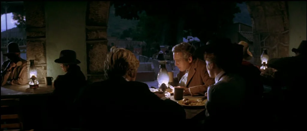 Butch Cassidy and the Sundance Kid (1969) movie still: wide — A dark, rustic stone-walled space features multiple arched openings looking out into…