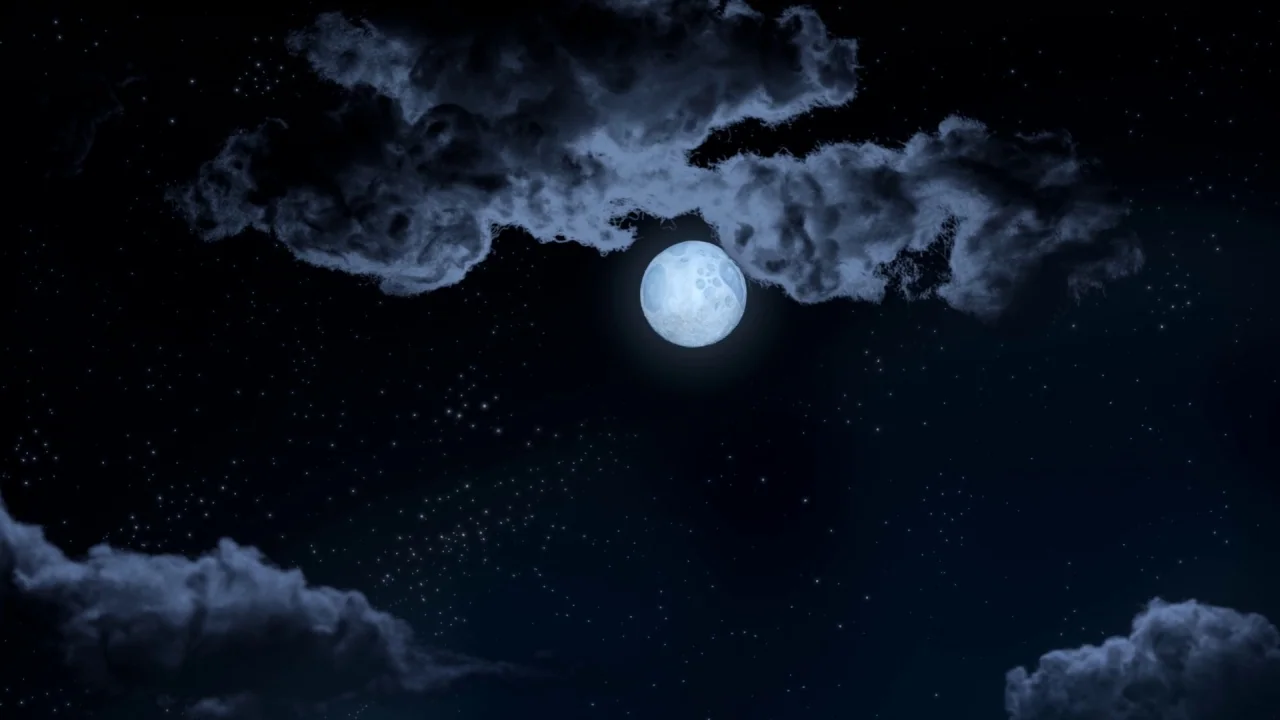 My Life as a Zucchini (2016) movie still: establishing — A night sky features a bright full moon centered amidst scattered dense clouds. Tiny bright…