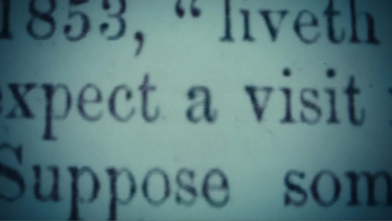 Demon in the White House (2021) movie still: closeup — A close-up view of vintage-style printed serif text on a paper surface. The text includes the…