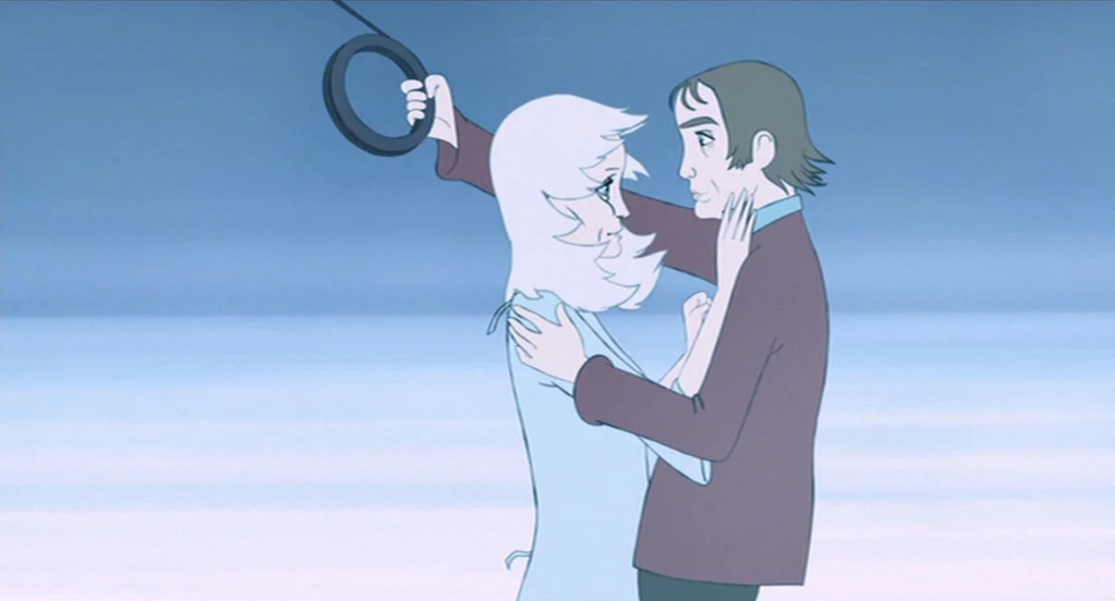 The Congress (2013) movie still: medium — An animated interior of a train carriage with a simple blue background. A man and a woman stand together…