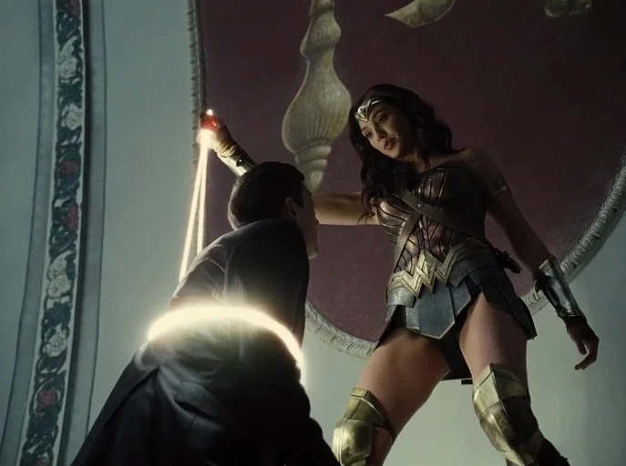 Zack Snyder's Justice League (2021) movie still: medium — A high-ceilinged interior with a curved wall featuring a large, ornate circular mural. A…