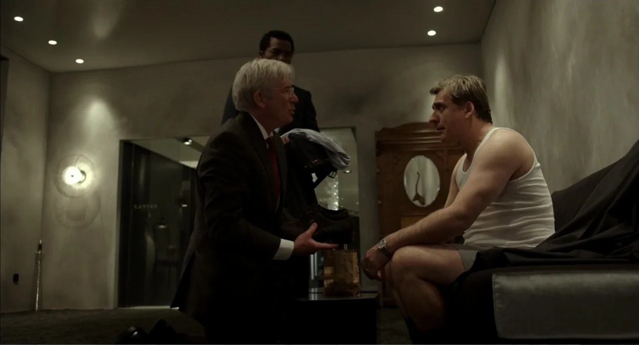 Norman: The Moderate Rise and Tragic Fall of a New York Fixer (2016) movie still: medium — A luxury dressing room with plastered grey walls,…