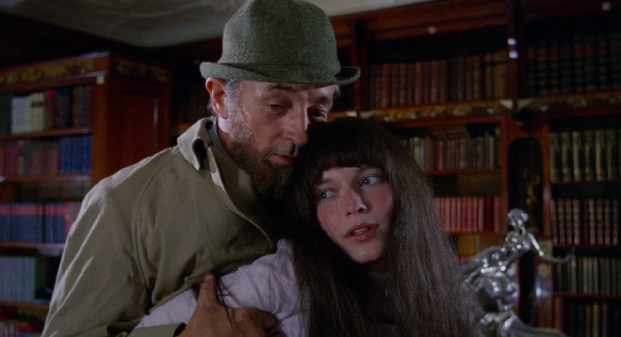 Secret Ceremony (1968) movie still: medium — A traditional room features dark wooden bookshelves densely packed with leather-bound volumes. A man…