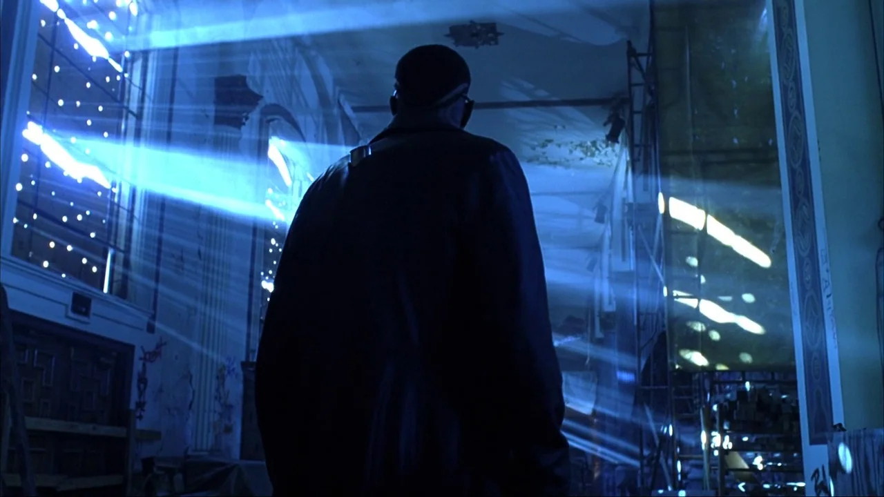Blade II (2002) movie still: medium — A dilapidated, partially demolished building features high arched windows and visible construction…