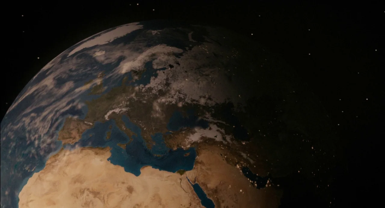Pasolini (2014) movie still: establishing — The planet Earth is captured from an orbital perspective in deep space. Continental landmasses and…