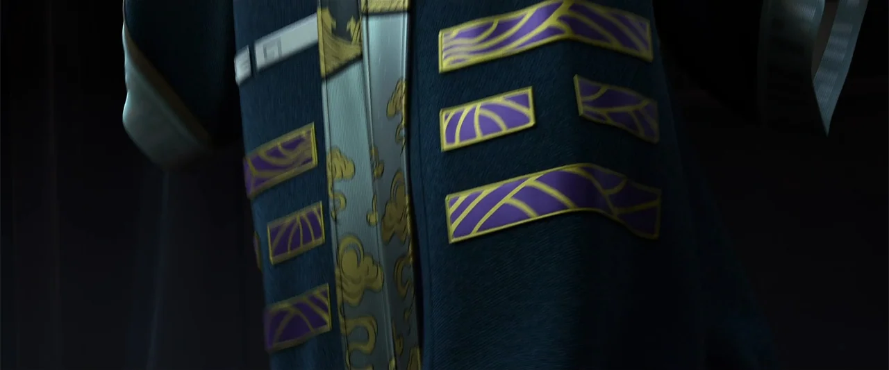 White Snake (2019) movie still: closeup — A close view of a dark blue, textured robe with gold and purple patches. The garment features geometric…