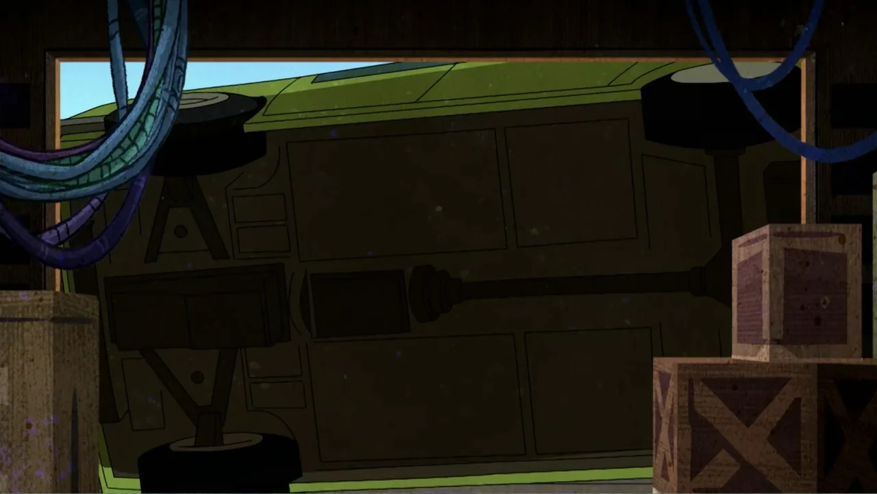 Ben 10 vs. the Universe: The Movie (2020) movie still: medium — A dimly lit garage interior shows the chassis of a green car lifted overhead.…