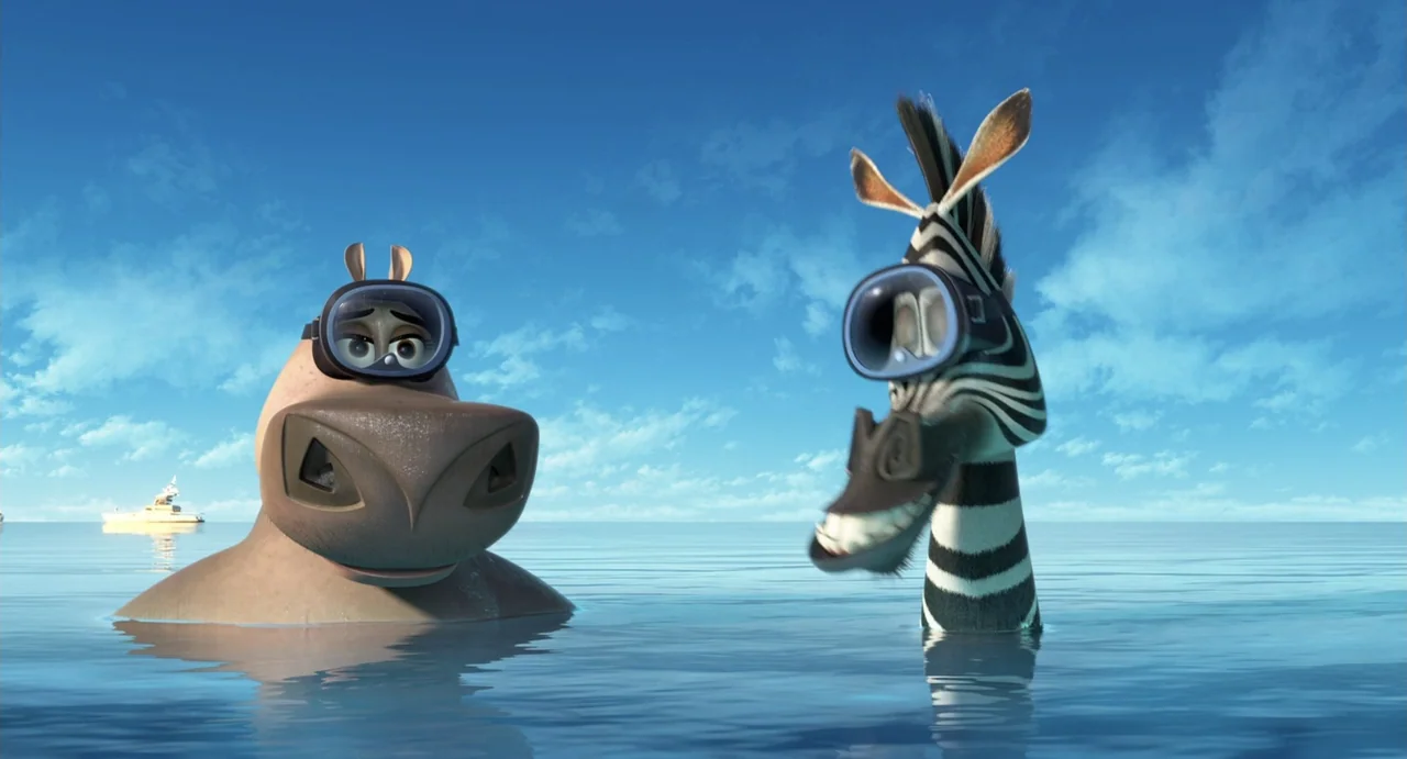 Madagascar 3: Europe's Most Wanted (2012) movie still: medium — A calm expanse of blue ocean under a clear sky during the day. A hippopotamus and a…