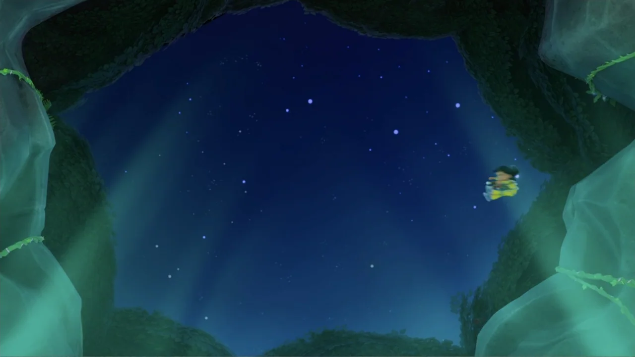 Valiente: A Tracker Story (2025) movie still: establishing — A dark cavern entrance frames a night sky filled with small glowing stars. The…