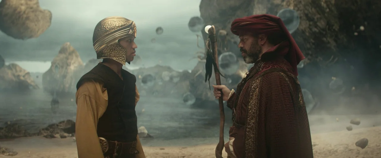Dungeons & Dragons: Honor Among Thieves (2023) movie still: medium — A rocky beach with floating translucent spheres and distant craggy rock…