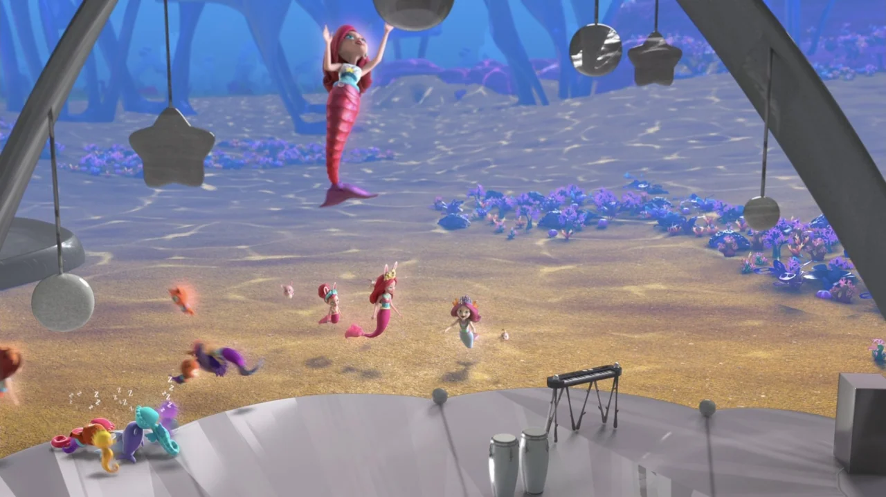 Enchantimals - Ocean Kingdom (2023) movie still: wide — An underwater performance area features hanging star ornaments and musical equipment on a…