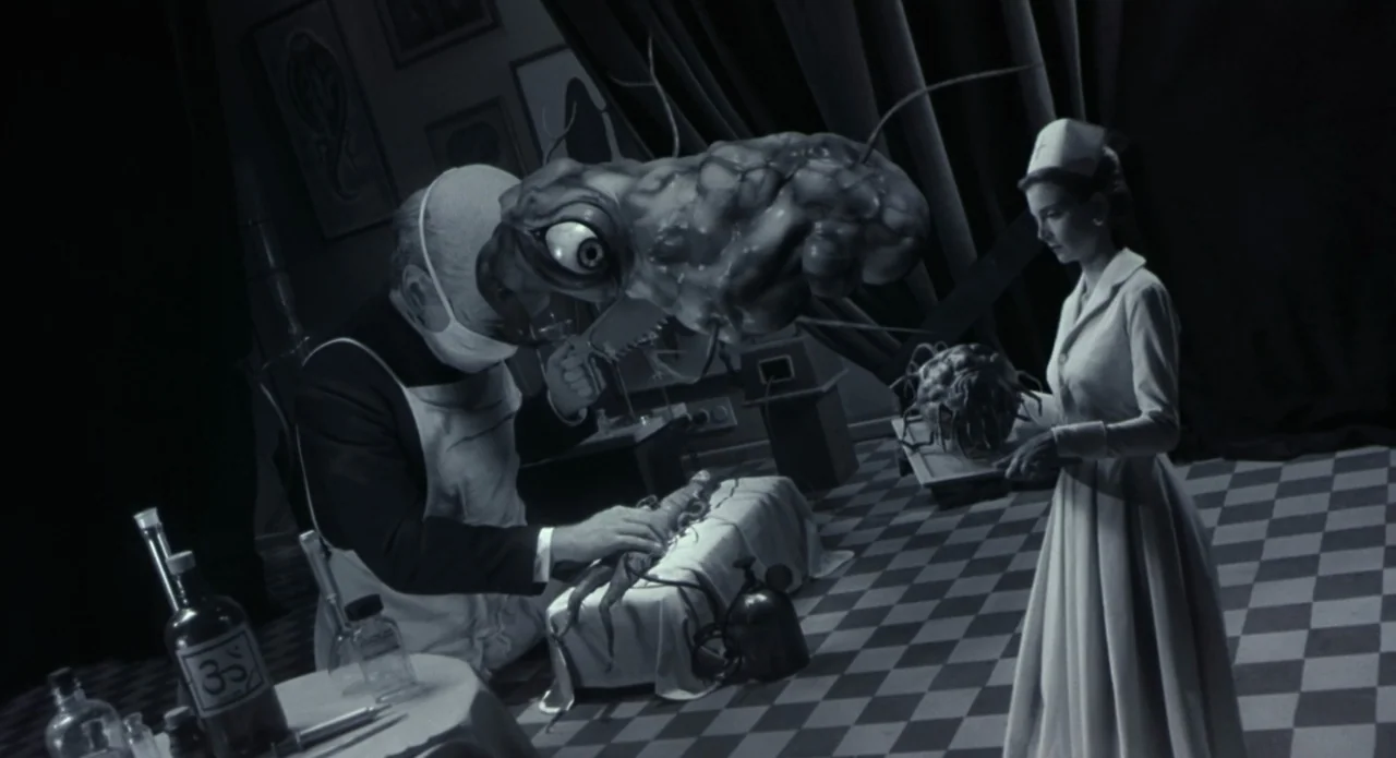 Monkeybone (2001) movie still: medium — A clinical laboratory featuring a black-and-white checkered floor and retro-scientific equipment. A masked…