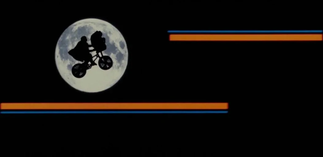 Memoirs of a Geisha (2005) movie still: wide — A full moon dominates the dark night sky with two figures silhouetted against it. A boy and an alien…