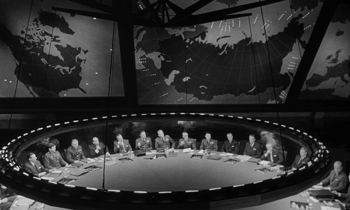 Dr. Strangelove or: How I Learned to Stop Worrying and Love the Bomb (1964) movie still: wide — A vast circular room features a massive glowing map…