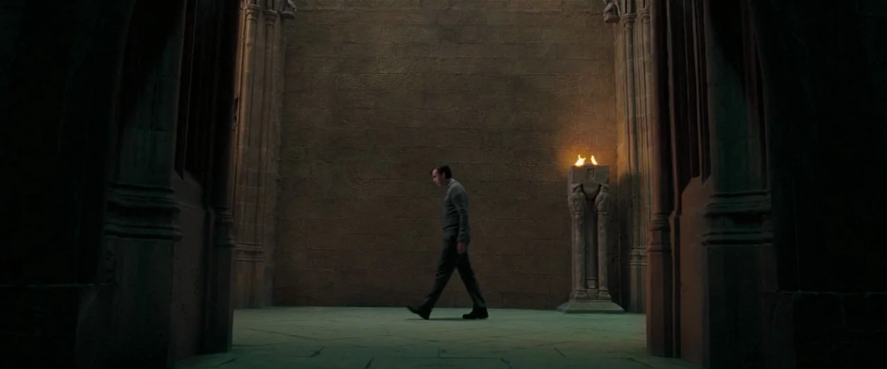 Harry Potter & The Order of the Phoenix (2007) movie still: wide — A wide stone hall features textured masonry walls and an overhead opening to…
