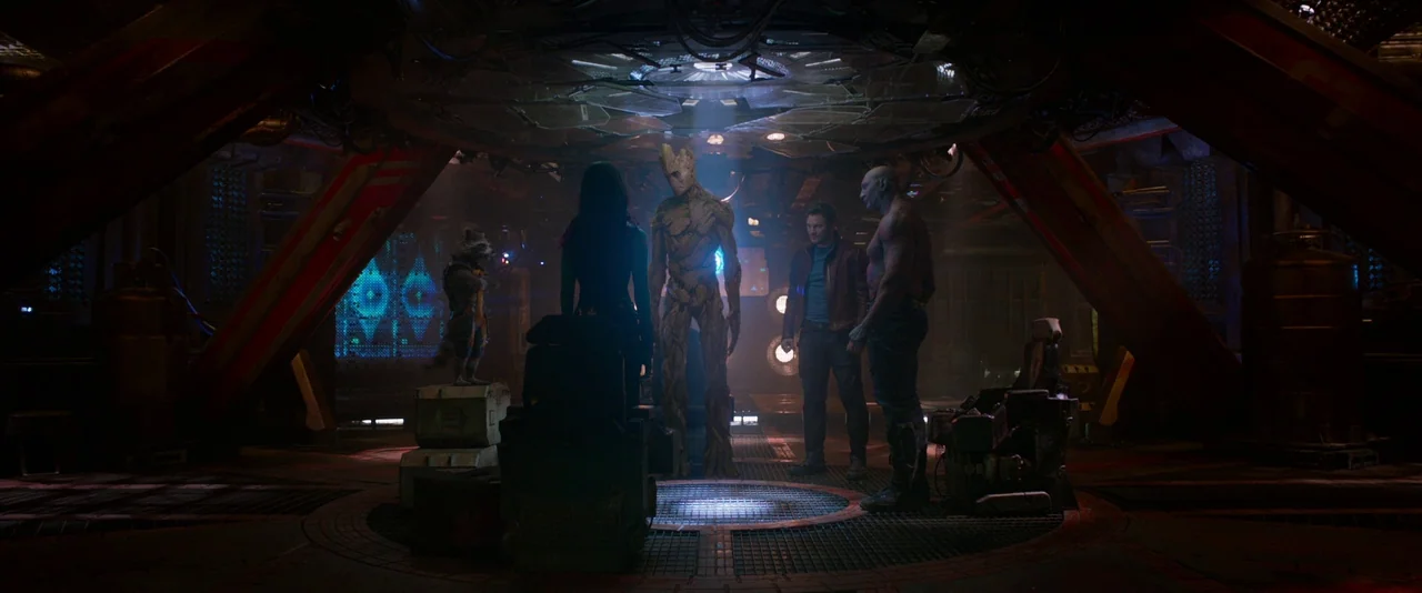 Guardians of the Galaxy (2014) movie still: wide — A dark, cramped technological workspace features metallic grating and heavy industrial framing.…