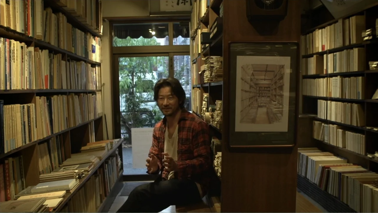 Flowers of Taipei: Taiwan New Cinema (2014) movie still: medium — A narrow shop filled with wooden shelves holding many books in every available…