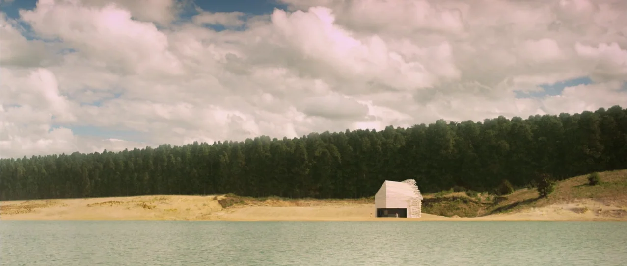Vanishing Waves (2012) movie still: establishing — A remote wooden structure stands on a sandy bank beside a large body of water. A dense line of…