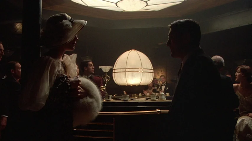 Once Upon A Time In America (1984) movie still: medium — A dimly lit upscale bar with period-accurate 1930s decor and several patrons in formal…