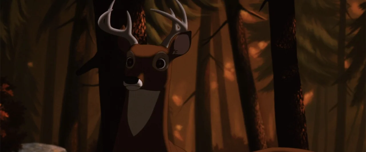 The Iron Giant (1999) movie still: medium — A dark, dense woodland with tall pine trees silhouetted against a dim orange glow. A brown deer with…