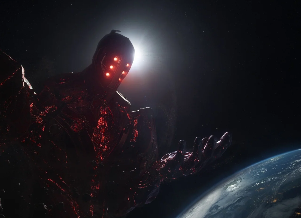 Eternals (2021) movie still: medium — A gargantuan robotic figure floats in the vast darkness of space above planet Earth. The entity features…