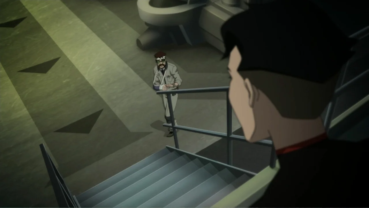 Reign of the Supermen (2019) movie still: medium — A industrial stairwell with metal handrails descends into a dimly lit concrete space. A man with…
