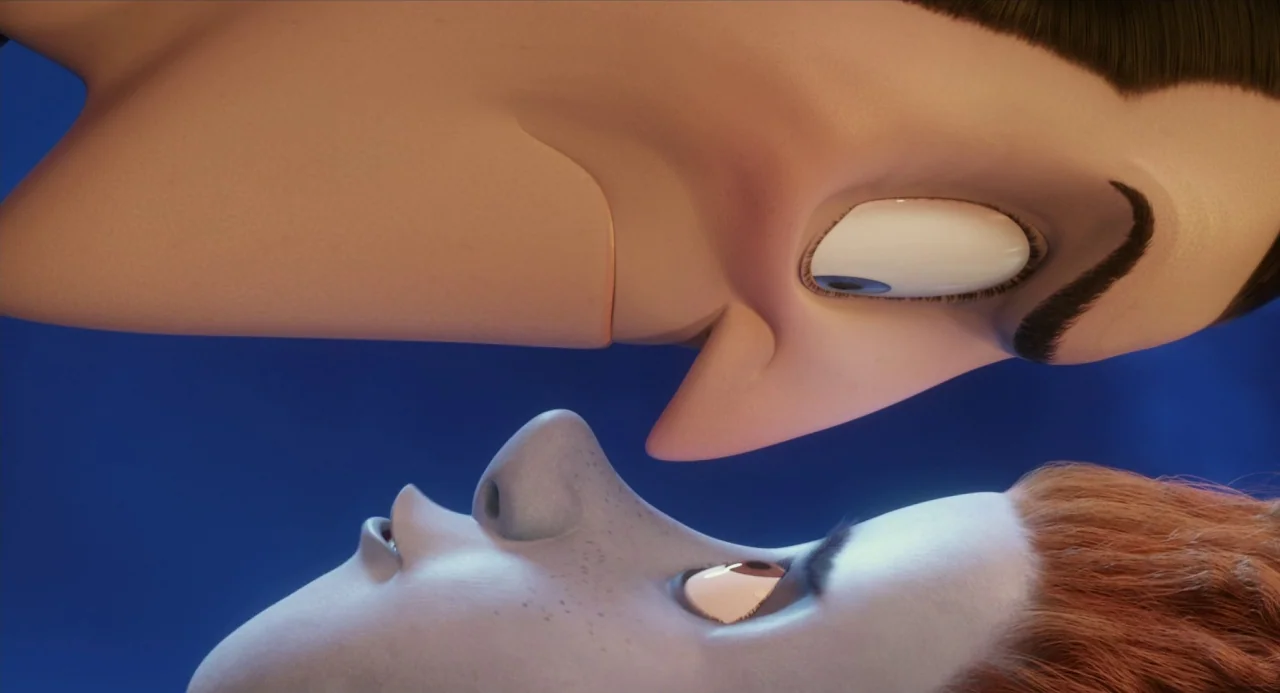 Hotel Transylvania movie still: closeup — Two animated characters are oriented in side profile against a solid blue background. The characters hold…