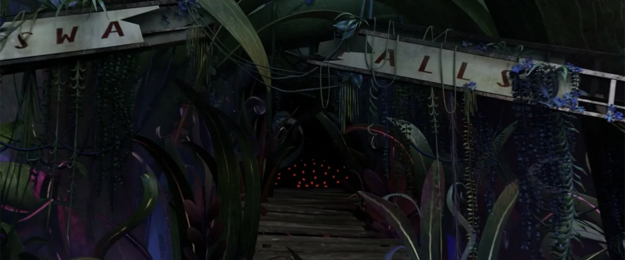 Cloudy with a Chance of Meatballs 2 (2013) movie still: establishing — An overgrown jungle entrance features wooden planks leading into a dark,…