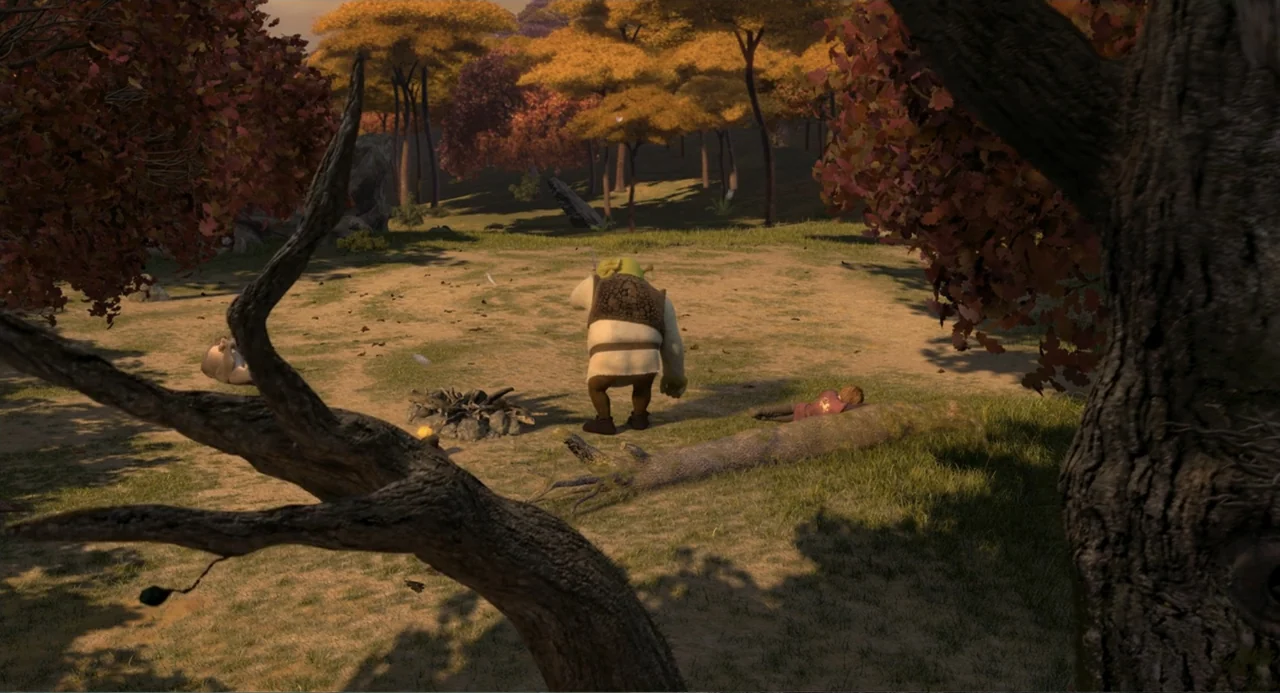 Shrek the Third (2007) movie still: wide — A sunny clearing features an ogre standing near a campfire and a log. The surrounding area contains…