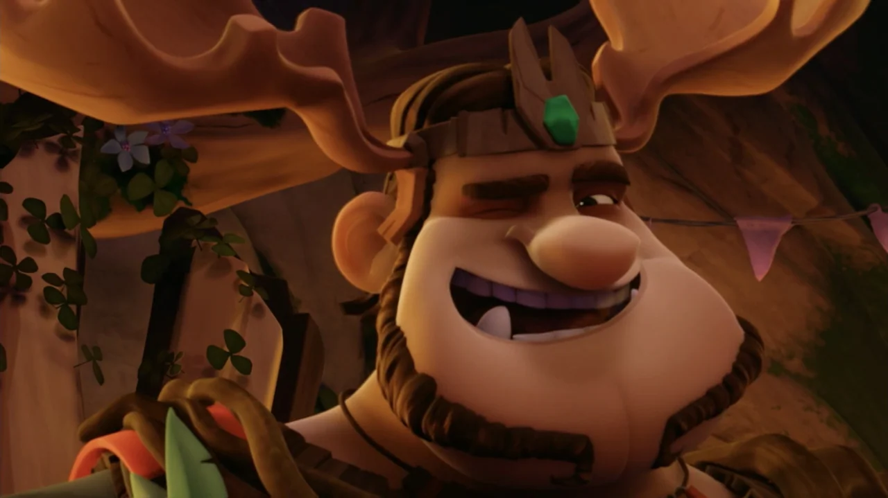 Troll: The Tale of a Tail (2018) movie still: closeup — A forested area with green foliage and natural earthy rock textures. A man wearing an antler…