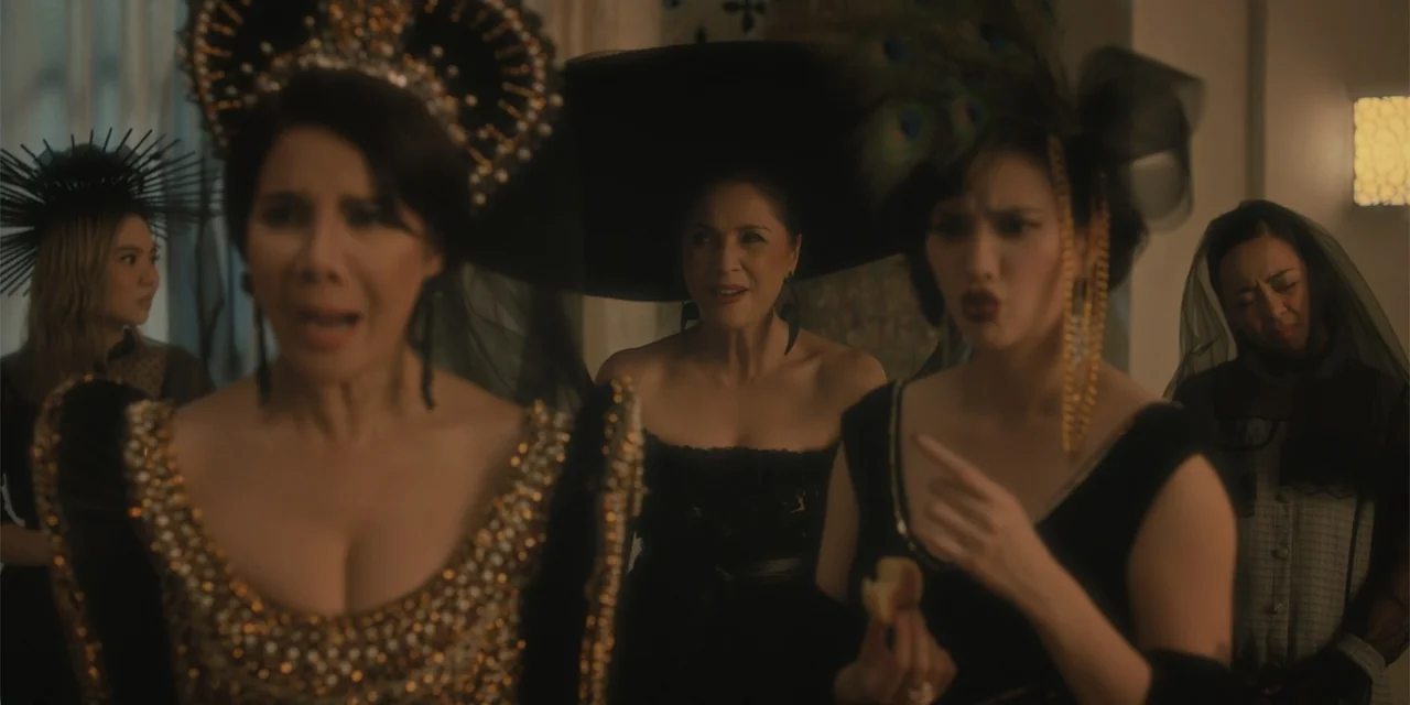 Ten Little Mistresses (2023) movie still: medium — A dimly lit event space featuring several women dressed in elaborate black formal evening wear.…