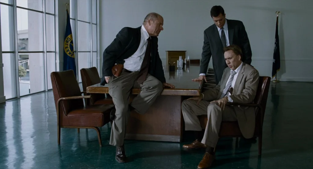 Bad Lieutenant: Port Of Call New Orleans (2009) movie still: wide — A spartan conference room features large windows and long tables with leather…