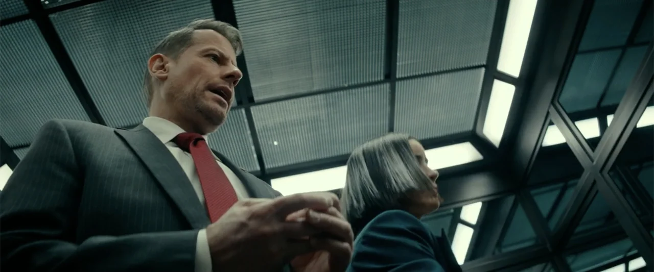 Bad Boys: Ride or Die (2024) movie still: medium — A modern, high-tech elevator interior features a geometric metal grid ceiling with integrated…