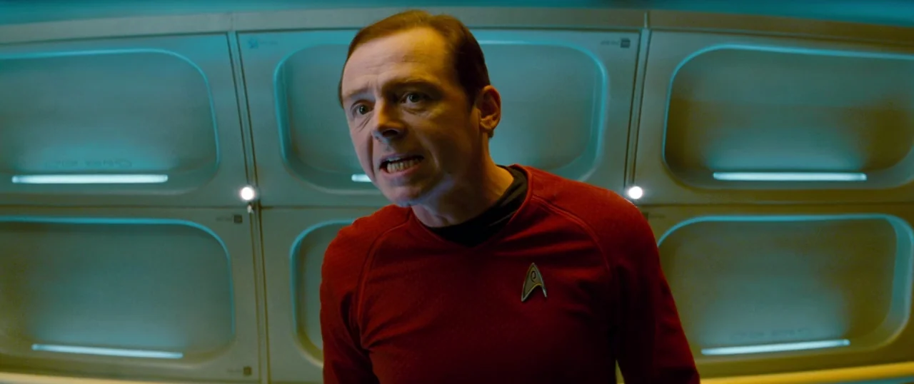 Star Trek Into Darkness (2013) movie still: medium — The interior of a starship displays symmetrical rows of glowing teal recessed wall panels. A…