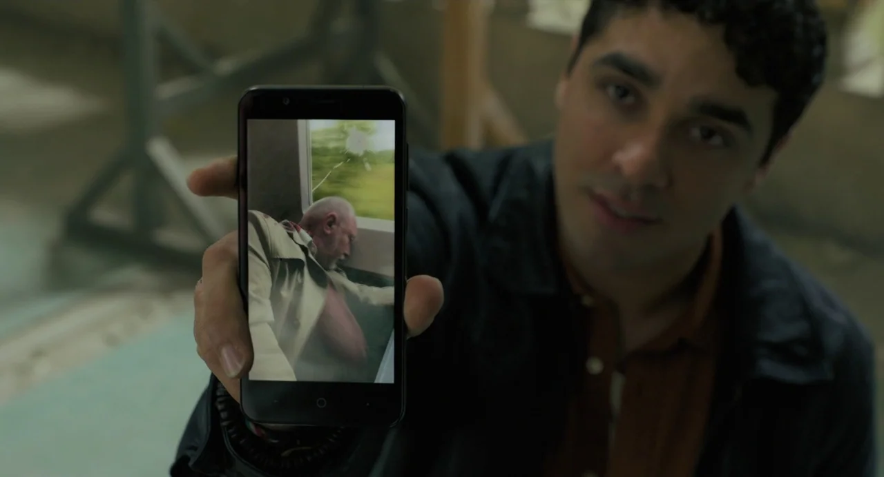 Gemini Man (2019) movie still: medium — An industrial interior space with blurred construction or structural elements in the background. A young man…