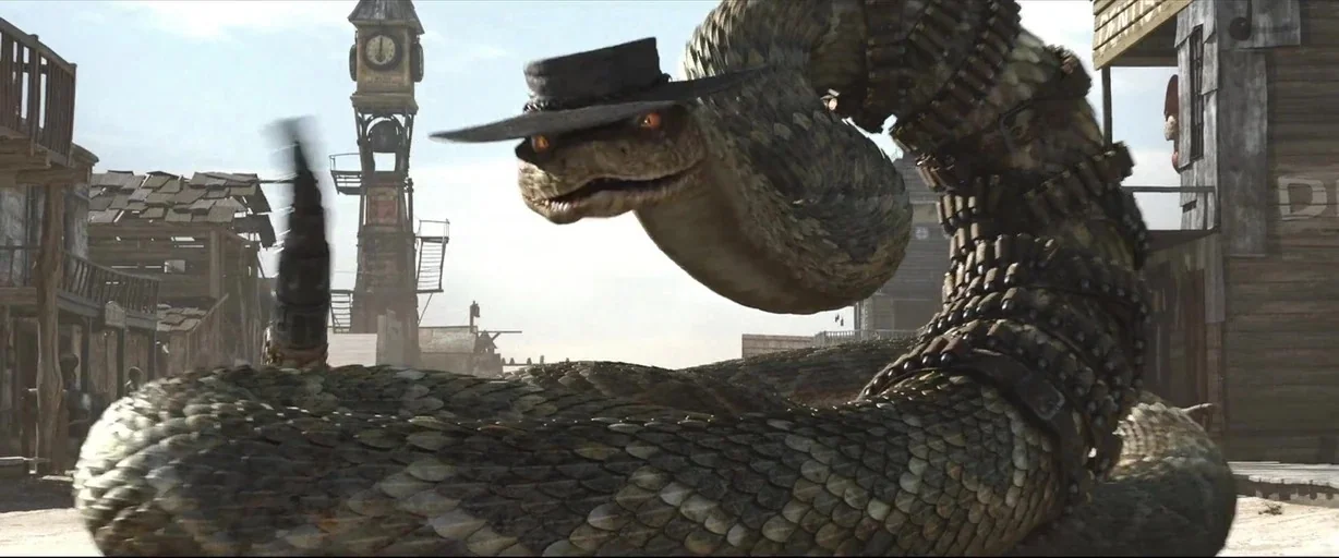 Rango (2011) movie still: medium — A dusty, sunlit frontier town square with wooden buildings and a distant clock tower. A giant rattlesnake wearing…