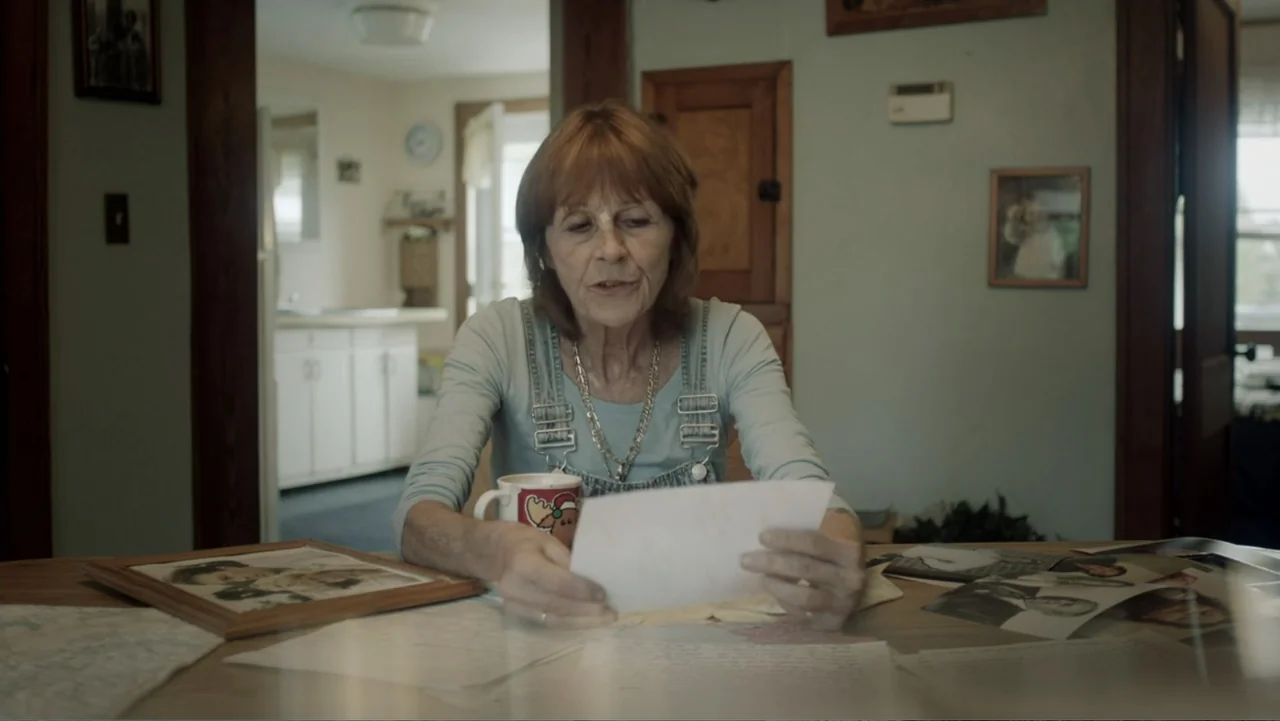 Aileen Wuornos : Mind of a Monster (2020) movie still: medium — A residential dining area features light blue walls, wood trim, and scattered family…