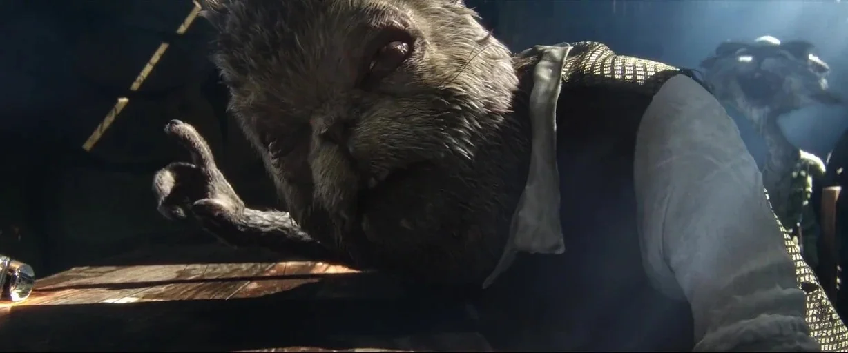 Rango (2011) movie still: closeup — A dimly lit tavern environment features wooden surfaces and hazy air. An anthropomorphic rabbit character leans…