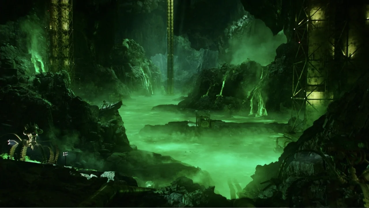 Aquaman and the Lost Kingdom (2023) movie still: establishing — A vast underground cavern features a glowing green river winding through jagged rock…