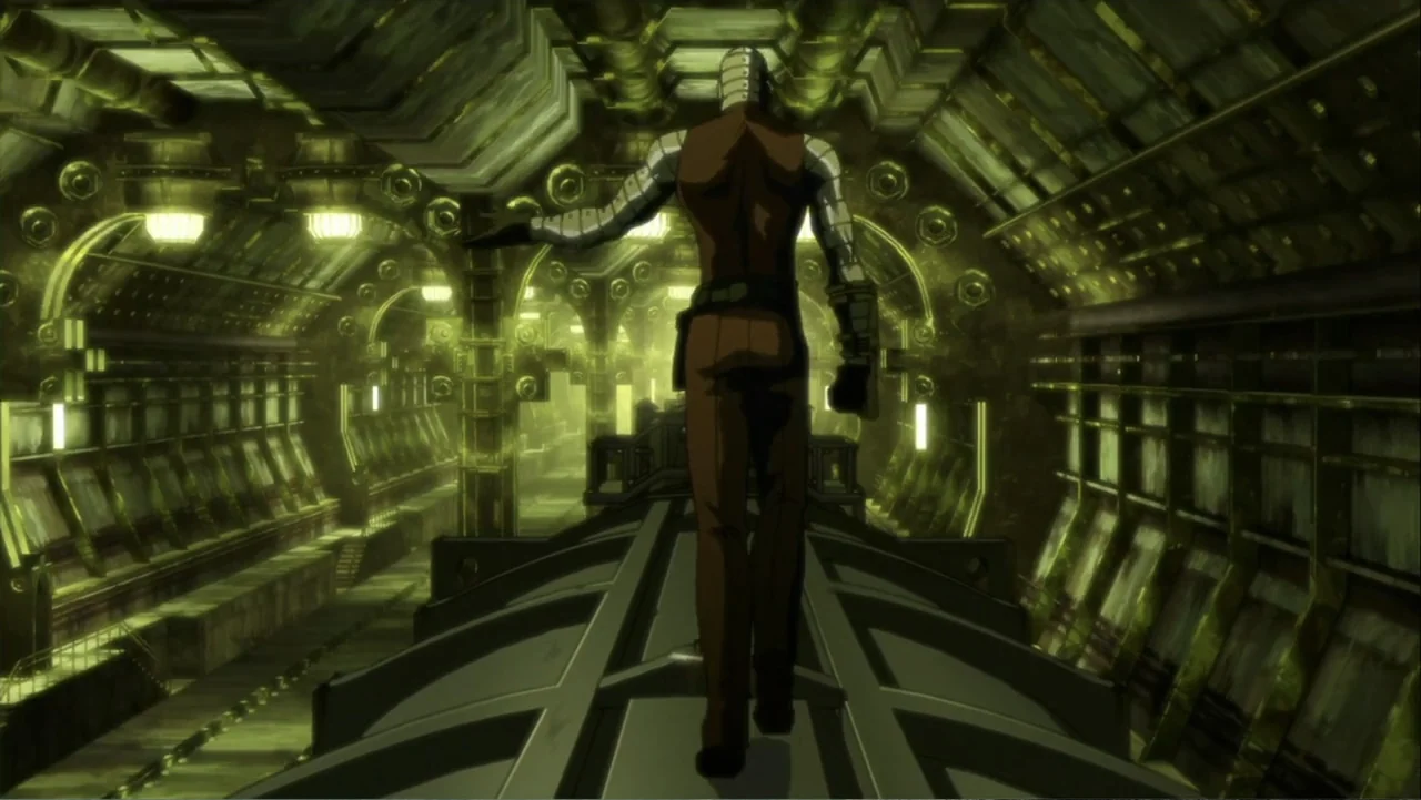 Batman: Gotham Knight (2008) movie still: fullbody — A dark subterranean industrial tunnel with green lit metallic pipes and heavy machinery panels.…