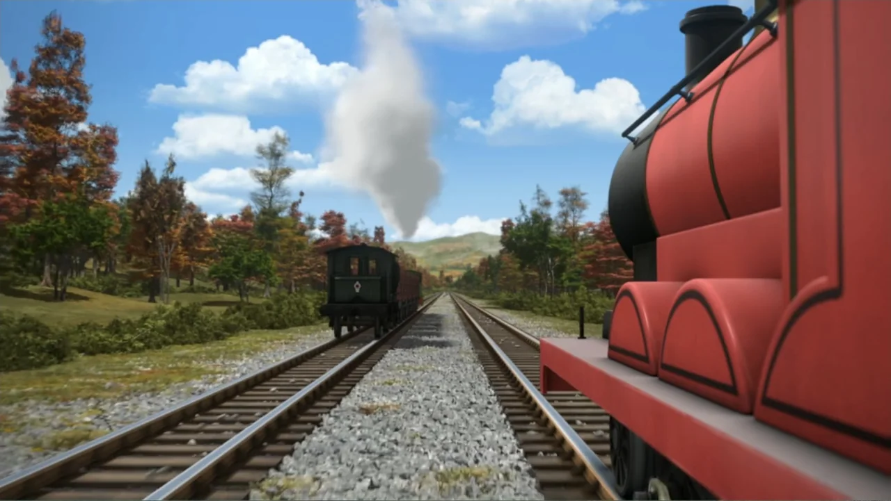 Thomas & Friends: Tale of the Brave (2014) movie still: wide — A bright day on a railway line surrounded by rolling hills and autumn trees. A large…