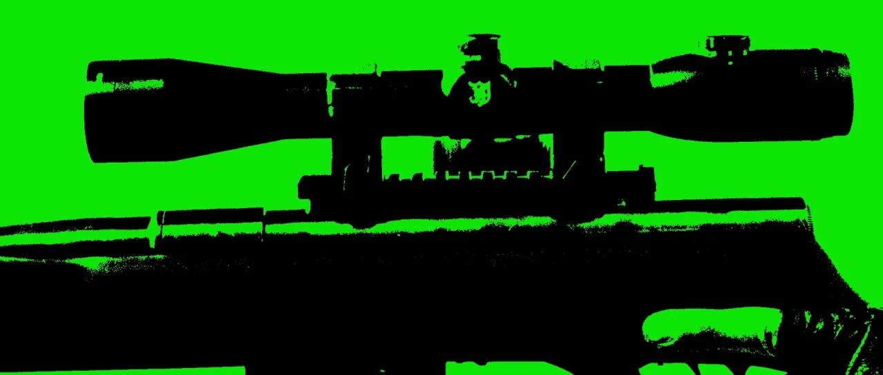 Let The Corpses Tan (2017) movie still: closeup — An abstract, high-contrast composition features a black silhouette of a rifle against green. The…