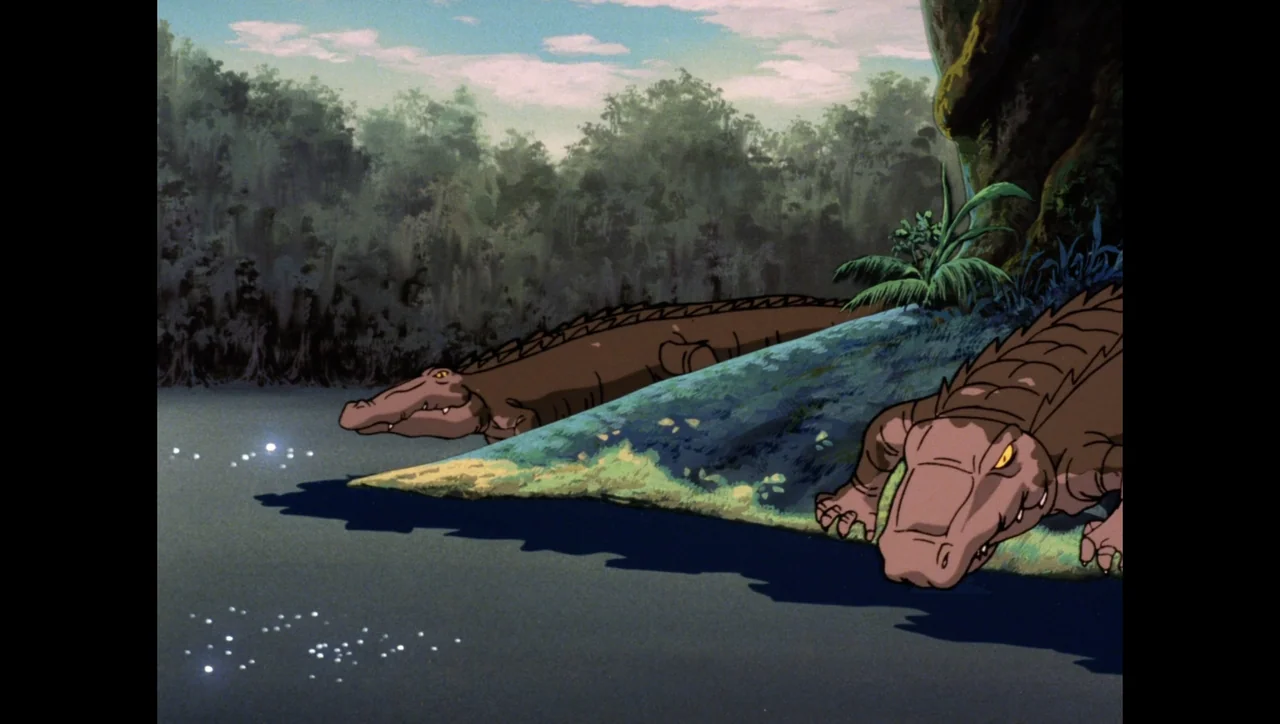 Scooby-Doo on Zombie Island (1998) movie still: medium — A muddy riverbank features dense green vegetation under a partially clouded sky. Two large…
