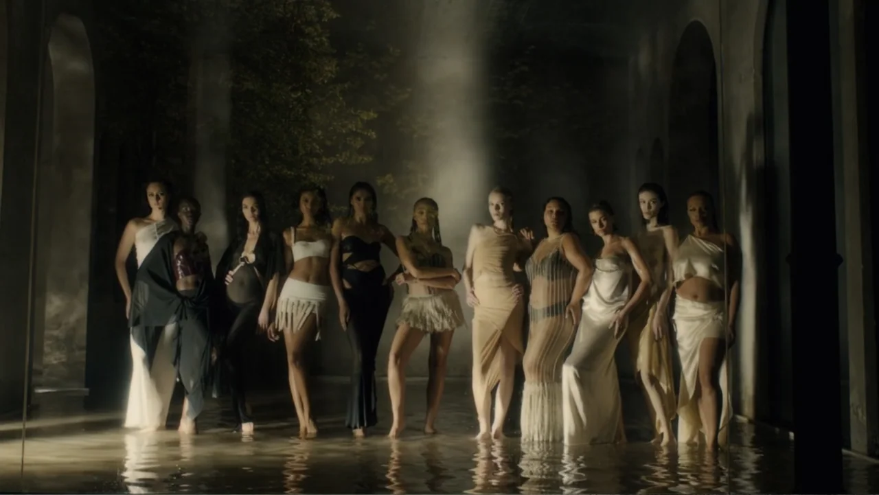 Victoria's Secret: The Tour '23 (2023) movie still: fullbody — An interior hall with stone arches is flooded with several inches of standing water.…