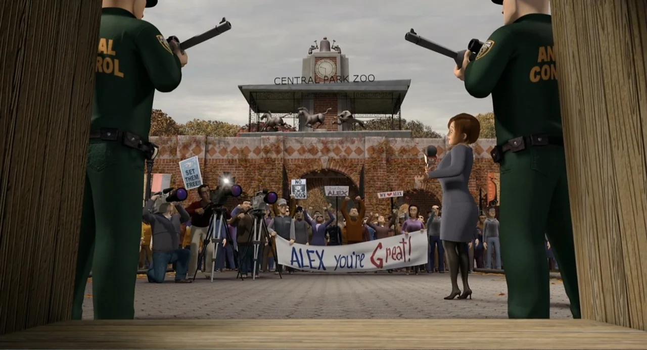 Madagascar (2005) movie still: wide — The stone entrance gates of a city zoo are visible in the distance. A large crowd gathers behind a banner to…
