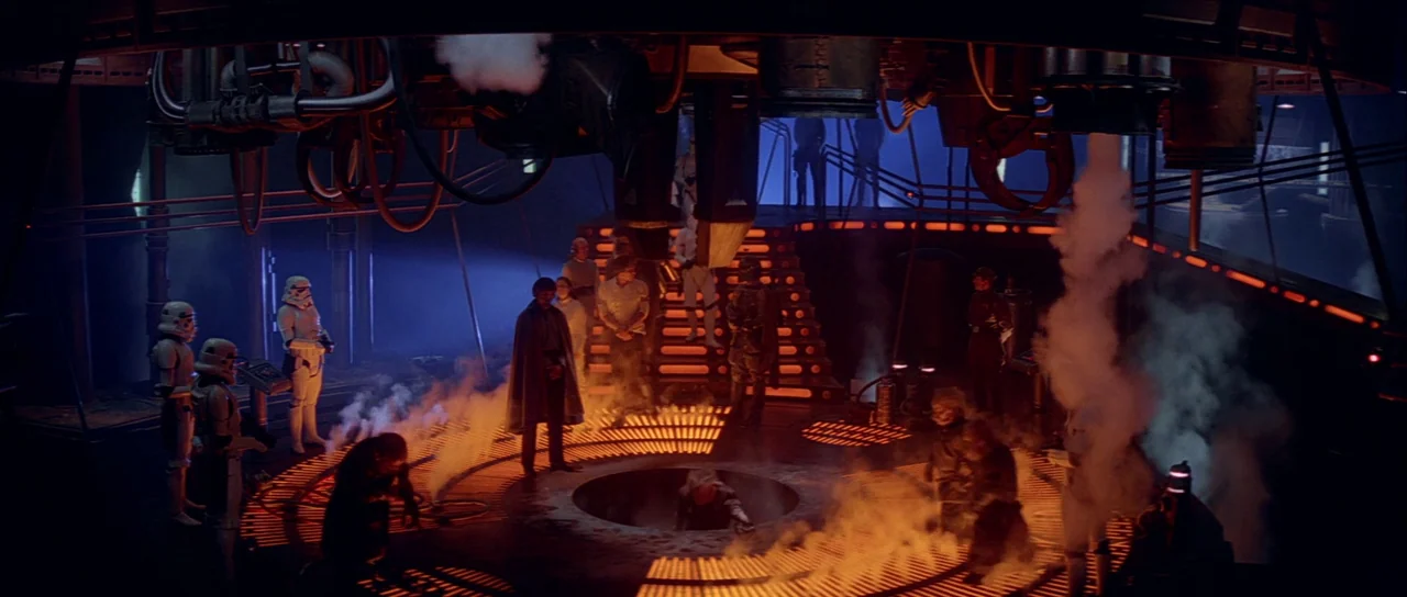 The Empire Strikes Back (1980) movie still: wide — An industrial facility featuring a central circular platform with bright glowing orange floor…