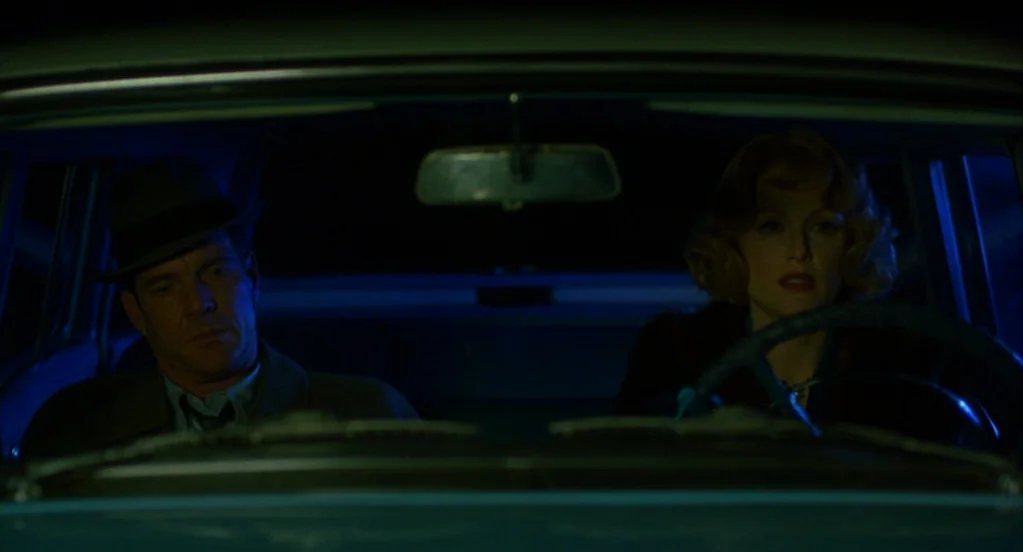Far From Heaven (2002) movie still: medium — The interior of a vintage automobile at night with dark exterior surroundings visible through glass. A…