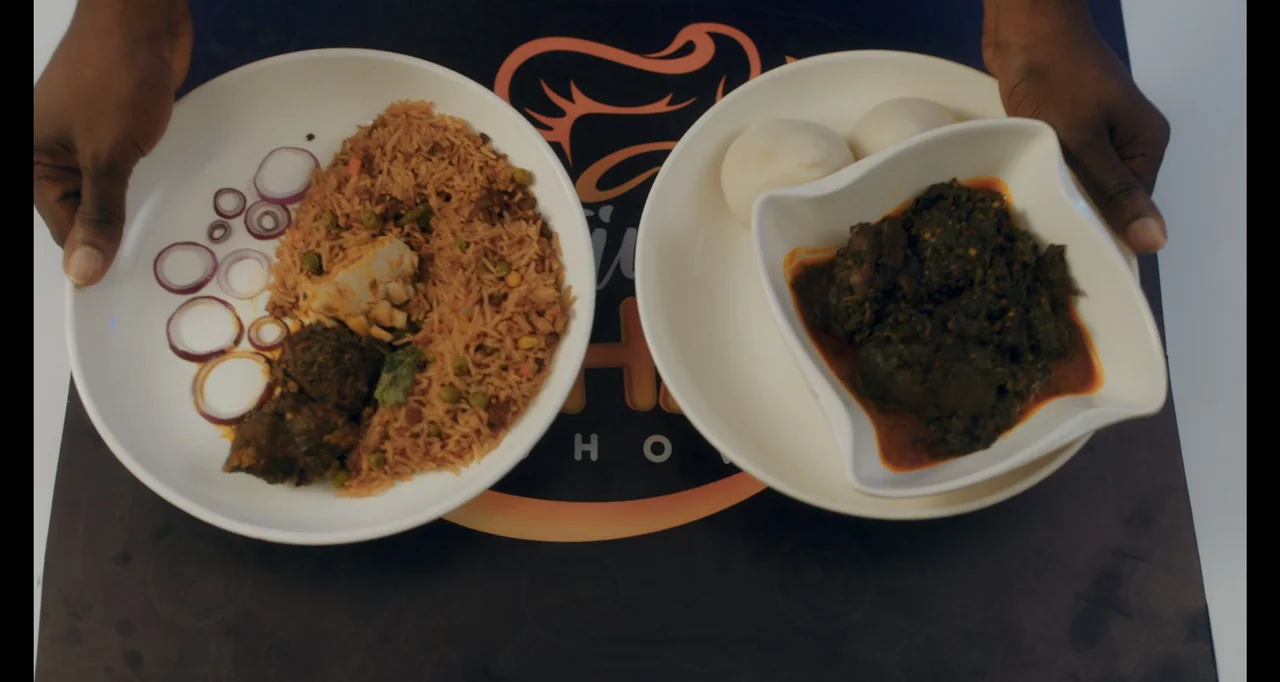 Love In A Pandemic (2023) movie still: medium — Two white ceramic plates are held over a dark branded surface. One plate contains seasoned rice with…