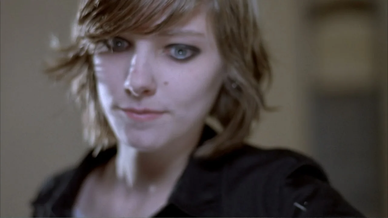 Paranoid Park (2007) movie still: closeup — An interior space provides a simple, neutral background for the subject's portrait. A young woman with…